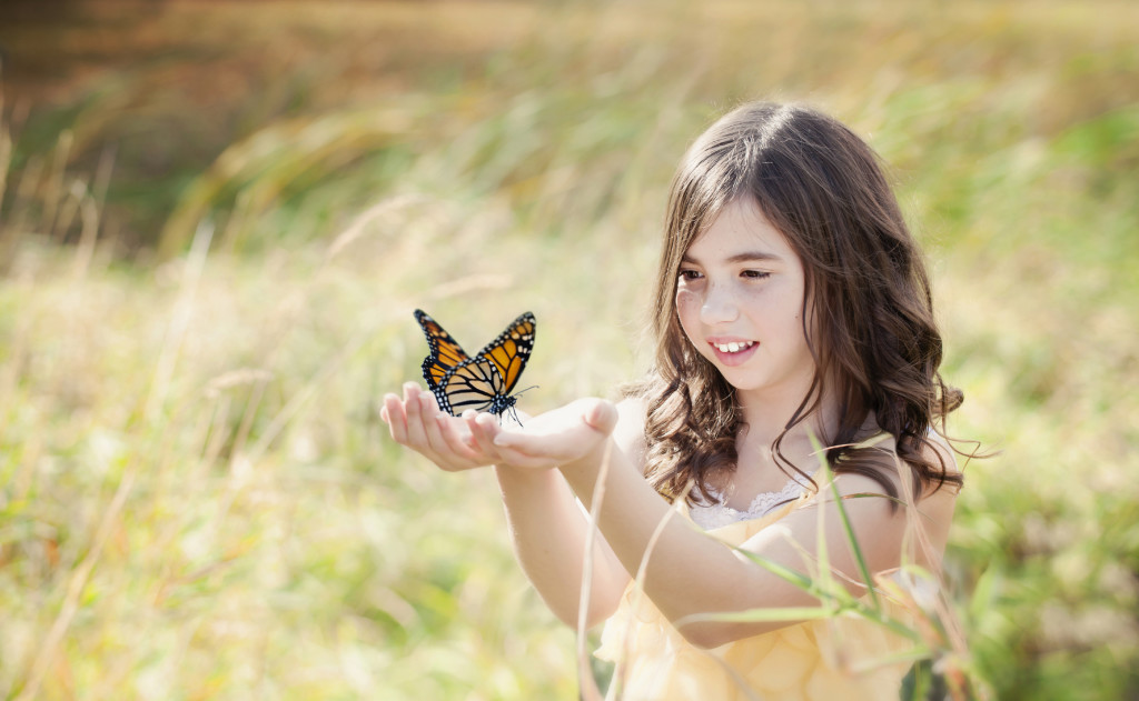 girl with butterfly photo